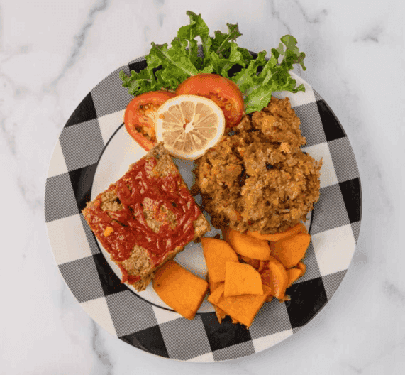 Zion Delight meatloaf and fried chicken with candied yams plate — Atlanta soul food
